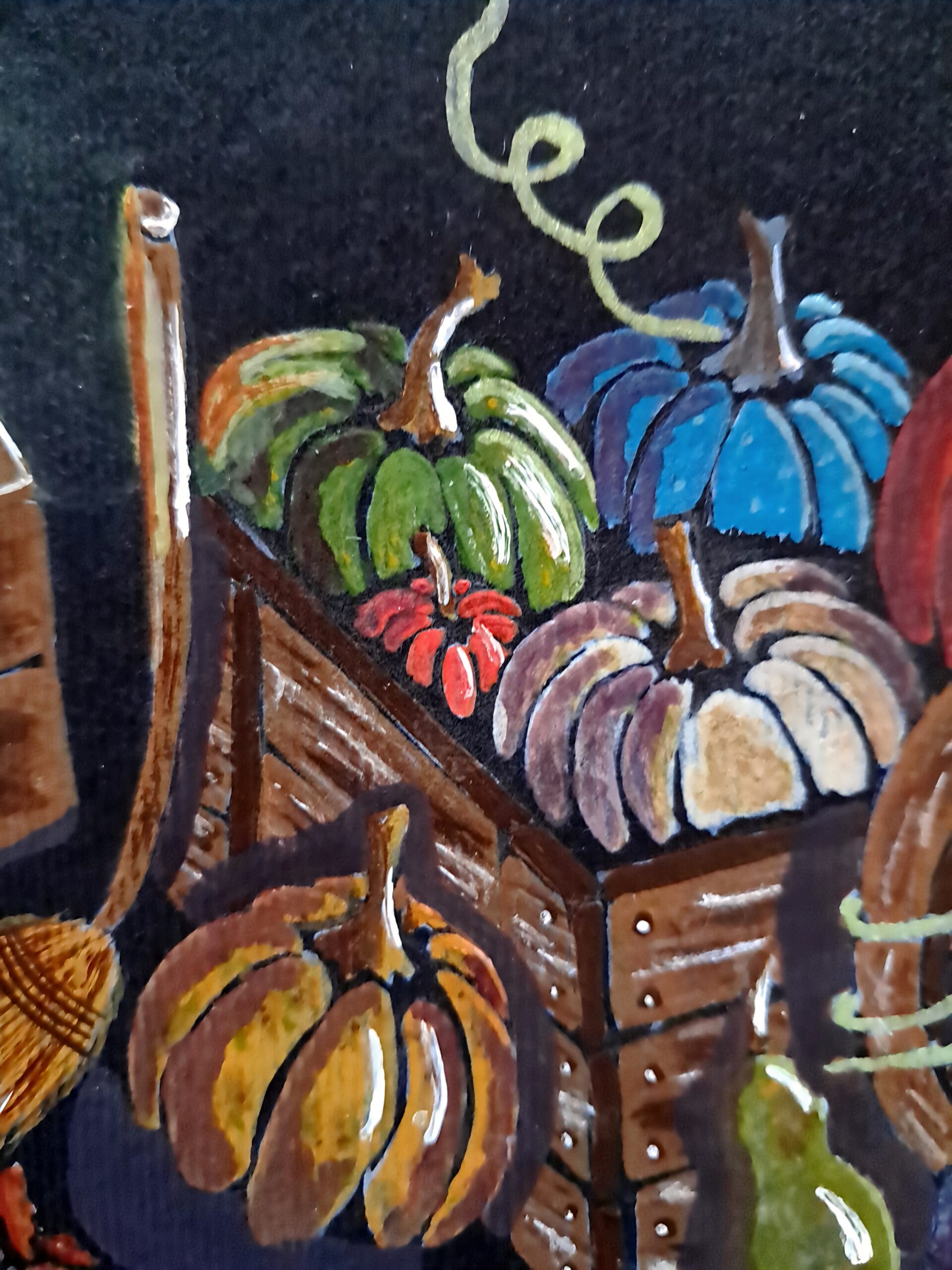 Détail de l'aquarelle "Adopt Your Pumpkin" montrant une caisse en bois remplie de citrouilles colorées sur papier noir.